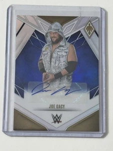 JOE GACY 2023 PANINI CHRONICLES PHOENIX WWE BLUE AUTOGRAPH #12/49 WYATT SICKS - Picture 1 of 2