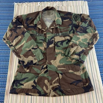Chaqueta BDU del Ejército de los Estados Unidos Para Hombres Mediana Regular Bosque Camuflaje Ripstop Clima Caliente USGI Foto 1 de 4