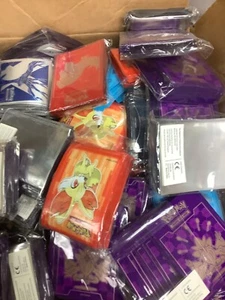 Mixed Lot 10 packs of Pokemon TCG 50-65ct Deck Card Sleeve Packs dmg packaging - Picture 1 of 1