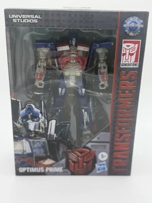 Hasbro Transformers Universal Studios Deluxe Class Optimus Prime Figure - Image 1 of 4