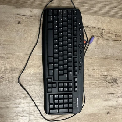 Microsoft black keyboard model RT2300 with old style connector. Barely used. - Image 1 of 4