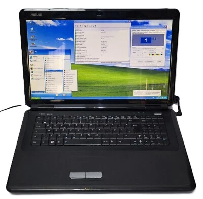 ASUS Windows XP Gamer Notebook  Athlon X2 500GB 4GB Laptop HDMI HD 4570 17,3" - Bild 1 von 4