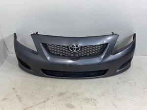 2009-2013 Toyota Corolla Front Bumper Assembly W/O Spoiler; W/O Fog Lamps Oem. - Picture 1 of 12