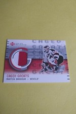MARTIN BRODEUR 2001-02 UPPER DECK MASK COLLECTION CAGED GREATS 2 COLOR JERSEY
