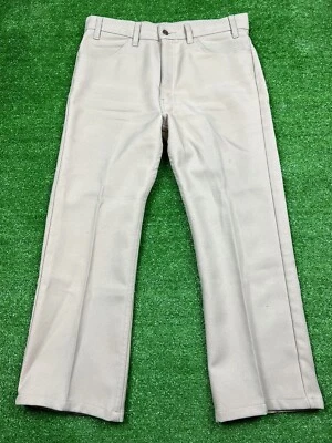 Pantalones Levi's Vintage Años 70 Levi Negro Pestaña Dorada Poliéster Pantalones Acampanados 35 x 30 Foto 1 de 4