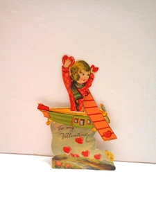 VINTAGE VALENTINE MECHANICAL CARD GIRL IN AIRPLANE MADE IN GERMANY - Picture 1 of 4