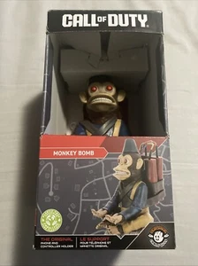 CALL OF DUTY MONKEY BOMB PHONE AND CONTROLLER HOLDER STAND BY CABLE GUYS - Photo 1 sur 5
