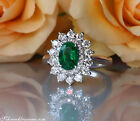 Prachtvoller Smaragd Ring "Entourage" | 1,76 ct. | Weißgold 750