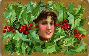 Vintage Christmas Postcard Pretty Girl Face tucked in Holly Embossed posted 1909 - Picture 1 of 4