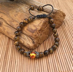 Braun Marmoriertes Armband aus Naturstein mit Tigeraugen Perle, energetisch und - Bild 1 von 2