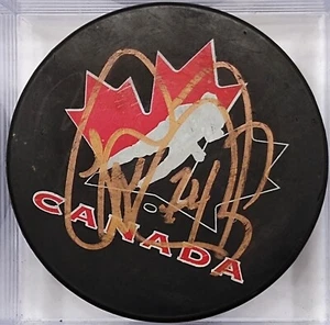 THEO FLEURY #24 Autographed Team Canada Olympic Gold NHL Hockey Puck Signed - Picture 1 of 1