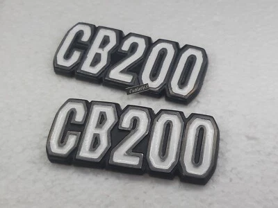 Marco lateral 2 piezas Honda CB200 CB 200 cubierta aire limpia emblema insignia logotipo autoadhesivo Foto 1 de 4