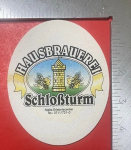 HAUSBRAUEREI SCHLOSSTURM. TUCHER  4.5 INCH OVAL  BEER COASTER - Picture 1 of 2