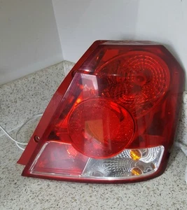 2005 CHEVROLET AVEO rear lights  TAIL LIGHT DRIVERS  SIDE 300267R - Picture 1 of 2