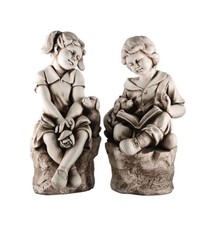 Statua bimbo o bimba con cane