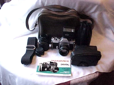 Hanimex 35SL 35mm Film SLR Camera With 55mm F/1.7 Lens + Accessories - Image 1 of 4