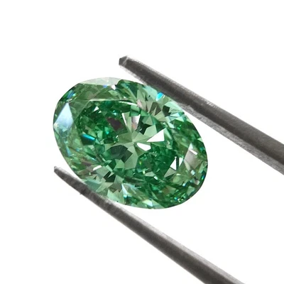1.00 Ct GIA Certified Natural Fancy Vivid Green Diamond – HPHT Treated Oval - Image 1 of 4