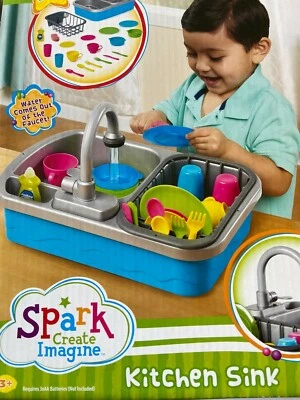 Fregadero de cocina con agua corriente por Create Foto 1 de 2