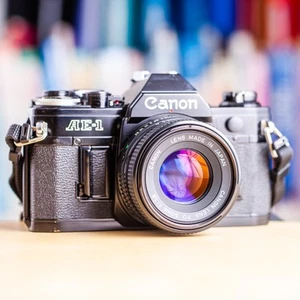 Rare Canon AE-1 Noir + 50mm f/1.8 FD + Filtre + Pile Black AE1 !! Super Offre !! - Photo 1/12