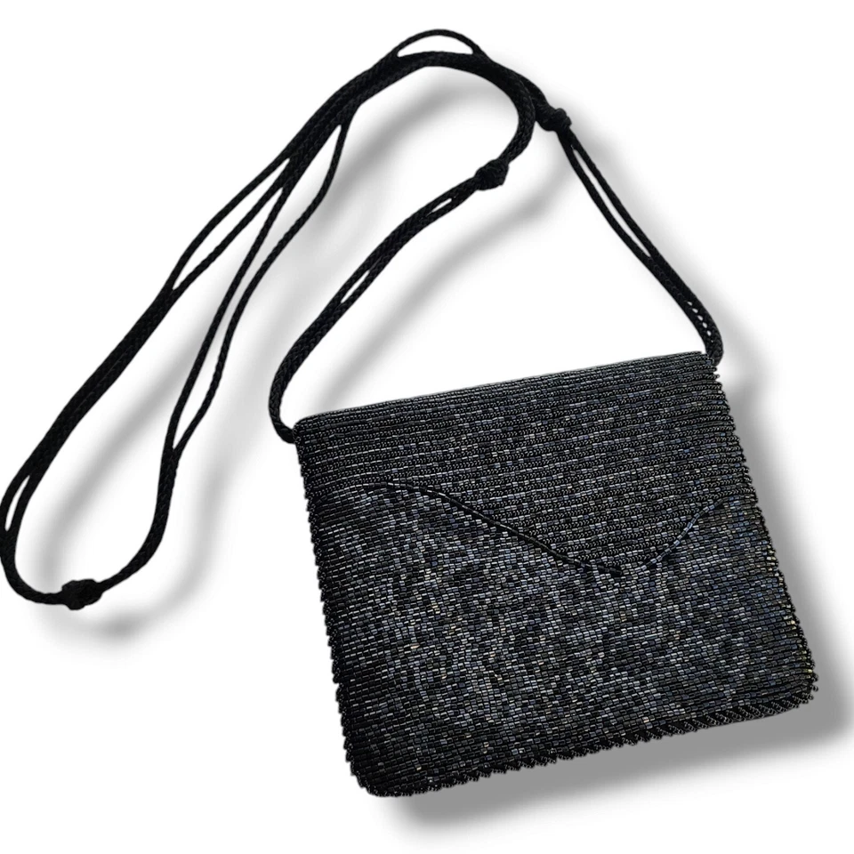 Bolso sin asas de hombro con cuentas Diane Von Furstenberg negro satinado vintage Foto 1 de 4