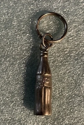 Coca Cola M.R. Мини бутылка серебряный тонированный брелок, очень хорошее состояние/б/у - Изображение 1 из 3