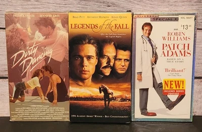 Lot Of Three VHS Movies. DIRTY DANCING, LEGENDS IN THE FALL, PATCH ADAMS - Image 1 of 2