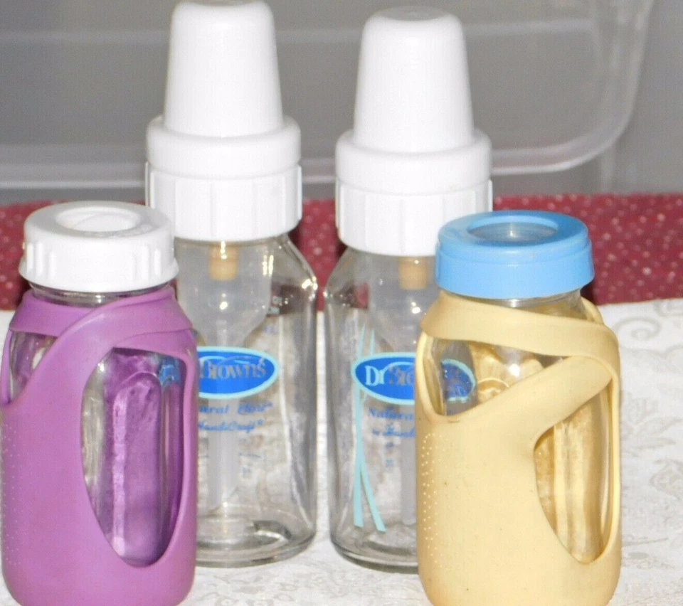 Lot 6 Glass Bottles  Born Free Dr Browns Evenflo + 2 Covers Caps Nipples Inserts - Image 1 of 4
