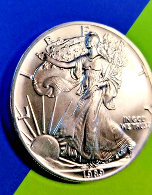 1989  SILVER EAGLE HOTTIE!!  THESE KEEP GOING UP UP UP!  DON'T GET LEFT BEHIND!! - Image 1 of 3