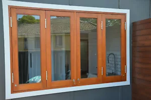BIFOLD WINDOWS, SOLID CEDAR TIMBER, 2400W X 1200H, FULLY BUILT, IN STOCK - Picture 1 of 5