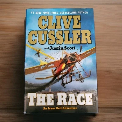 Isaac Bell: The Race 4  Justin Scott, Clive Cussler 2011, HCDJ 1st Ed 1st Print  - Image 1 of 4