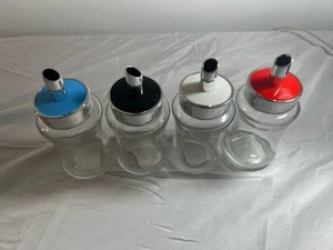 Lot of 61 Glass Sugar Dispensers Multi Color Lids Bulk Restaurant Cafe Diner New - Picture 1 of 6