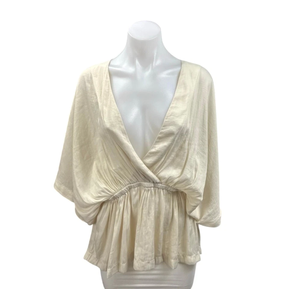 Top túnica peplum manga corta cuello en V imitación crema semilla mostaza talla L Foto 1 de 4