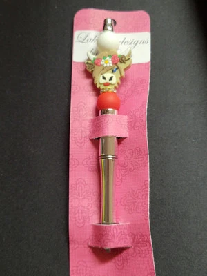 Adorable bolígrafo Highland Cow con cuentas tinta negra  Foto 1 de 4