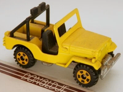 Tomica #57 Mitsubishi H-J58 Jeep 4x4 желтый - масштаб 1:57 - Изображение 1 из 2
