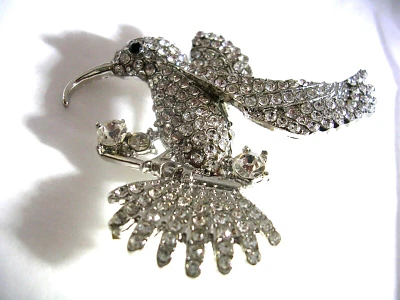 JUEGO DE ALFILER COLIBRÍ CON CIRCONITAS CÚBICAS EN ACERO INOXIDABLE CON OJO DE ZAFIRO Foto 1 de 4