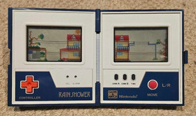 NINTENDO RAIN SHOWER Game and Watch vintage electronic handheld LCD game 1983