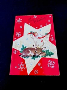 1 biglietto di auguri vintage Marjorie Cooper Natale dolce angelo che dorme sulle corna di cervo - Foto 1 di 3