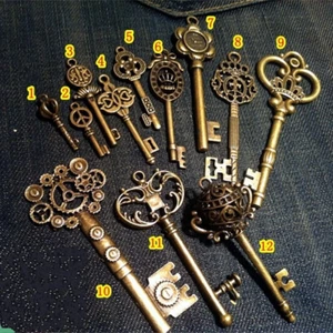 Vintage Skeleton Keys Charm Set Royal Key in Antique Bronze Pack of 12      - Picture 1 of 4