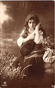 PORTRAIT OF A PRETTY GIRL :HOLDING MANDOLIN : SLOVENIA, CROATIA, SLOVENIA : RPPC - Picture 1 of 3