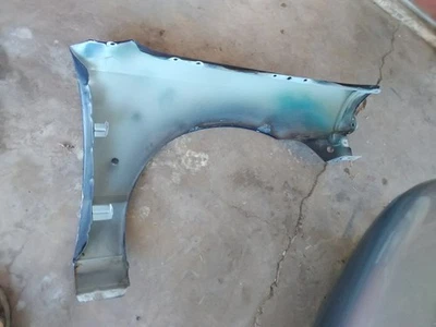 Guardabarros delantero Ford Contour 1999 conductor Foto 1 de 4