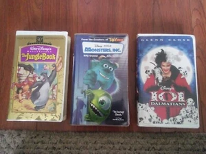 Lot of 3 Disney VHS Clamshell Monsters,Inc Jungle Book 101 Dalmatians - Picture 1 of 5