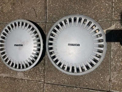 Mazda 626 1988-1992 14" par de cubiertas de rueda tapacubos OEM Foto 1 de 2