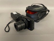 Sony Cyber-shot RX100 IV 20.1 MP Camera w/ case and spare battery