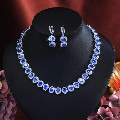 Conjunto de joyas nupciales enchapados en plata con collar de tenis de tanzanita ovalada azul Foto 1 de 4