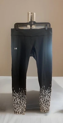 Leggings para mujer Under Armour negros plateados degradados estampado de puntos cremallera bolsillo grandes Foto 1 de 4