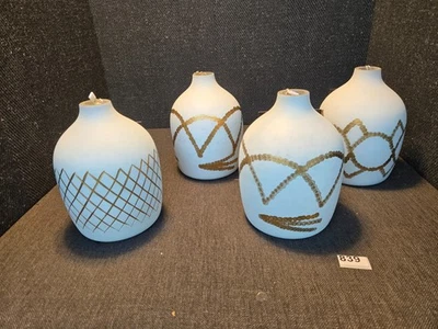 Botella de cerámica blanca y dorada Kavana Decor Foto 1 de 4