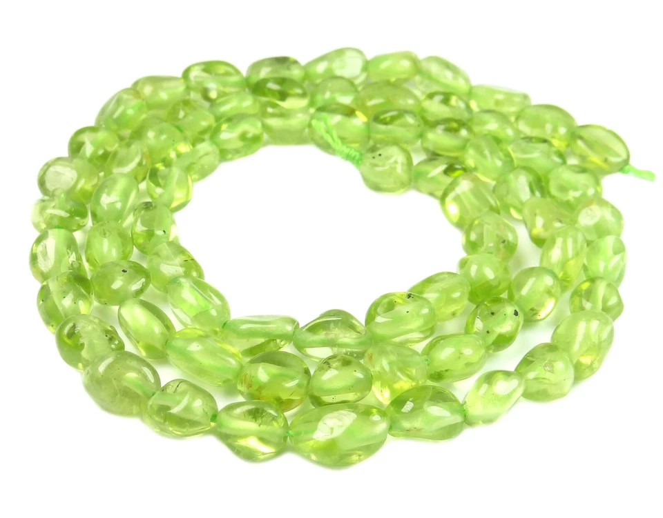 😏 Peridot kleine rundlich-ovale Nuggets ca. 5-7 mm Edelsteinperlen Strang 😉 - Bild 1 von 1