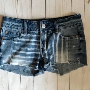 Pantalones Cortos American Eagle Stars Stripes Americana Juniors Talla 0 Jean Vaqueros (N5) - Imagen 1 de 7
