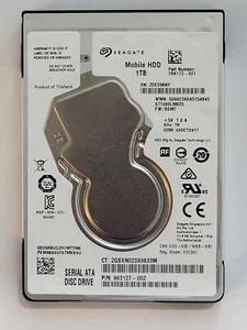 ST1000LM035, PN: 1RK172-021, SN: ZDE598NY, WU, FW: RSM7, Seagate 1Tb 2.5" HDD - Picture 1 of 2