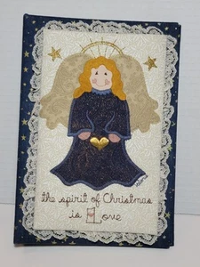 Valorie's Folk Art Fabric Bound Photo Album Christmas Angel Holds 60 (5" X 3.5") - Afbeelding 1 van 4